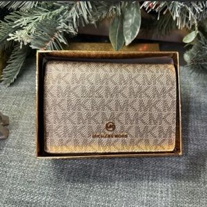 Michael Kors gold continental wallet. NWT.